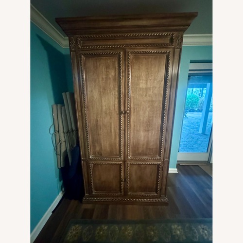 Used KRIESS Dark Brown Wood Armoire for sale on AptDeco