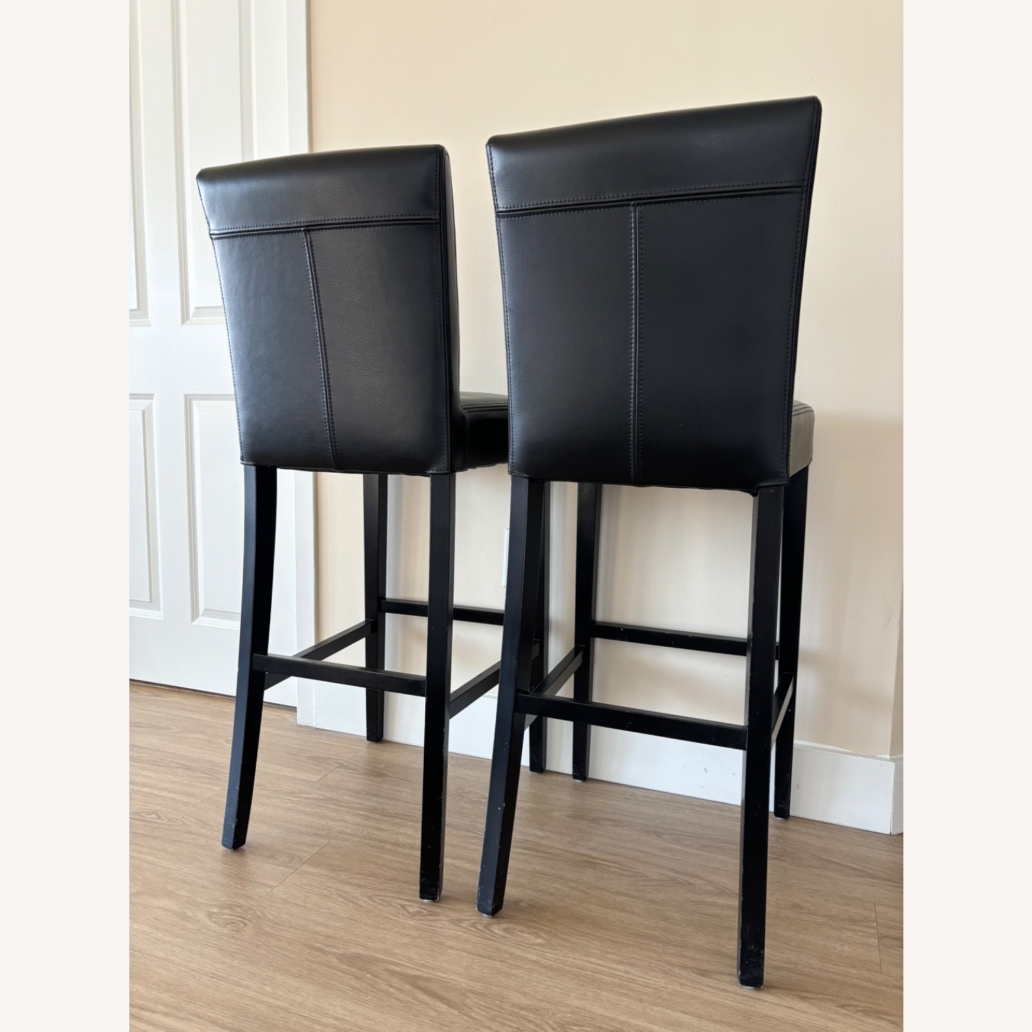 Crate & Barrel Lowe Black Leather Bar Stool Chairs - image-1