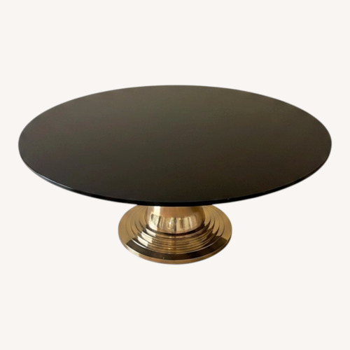 Used Black Metal Dining Table for sale on AptDeco