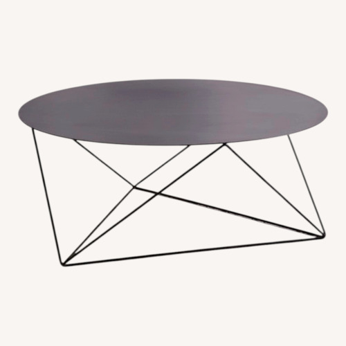Used West Elm Eric Trine Black Round Coffee Table  for sale on AptDeco
