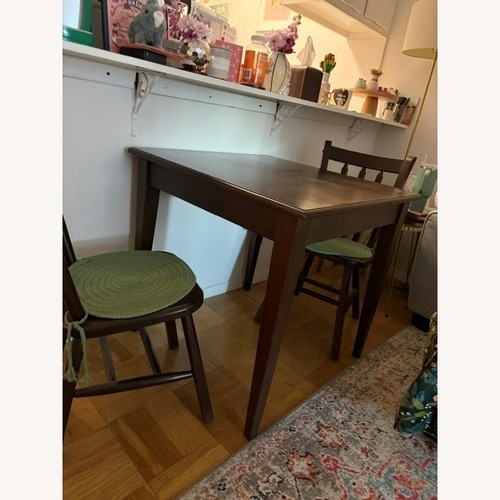 Used Vintage/Antique Finds Dark Brown Wood Dining Set for sale on AptDeco