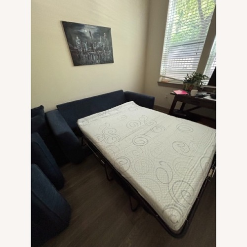 Used Rooms To Go Blue Fabric Sleeper Sofa for sale on AptDeco