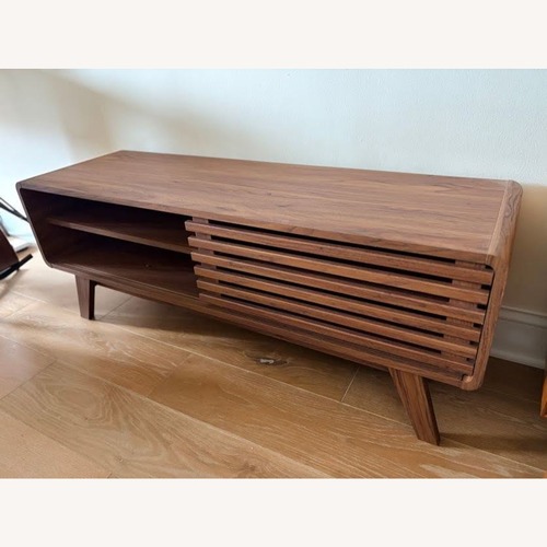 Used Macy's Modern Entertainment Center TV Stand for sale on AptDeco