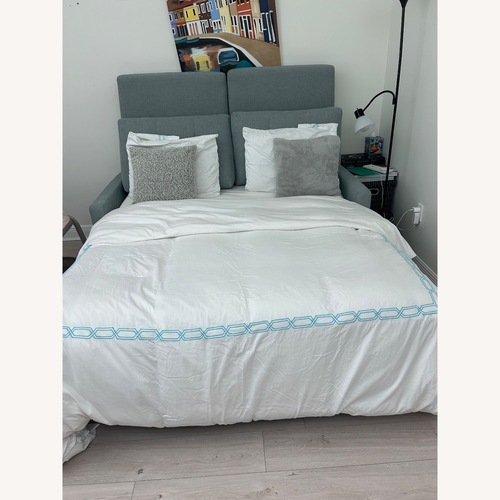 Used CB2 Bowen Tufted Queen Sleeper Sofa Blue Futon for sale on AptDeco