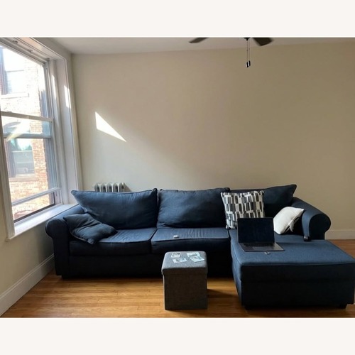 Used Bob's Discount Navy Blue Sectional Couch for sale on AptDeco