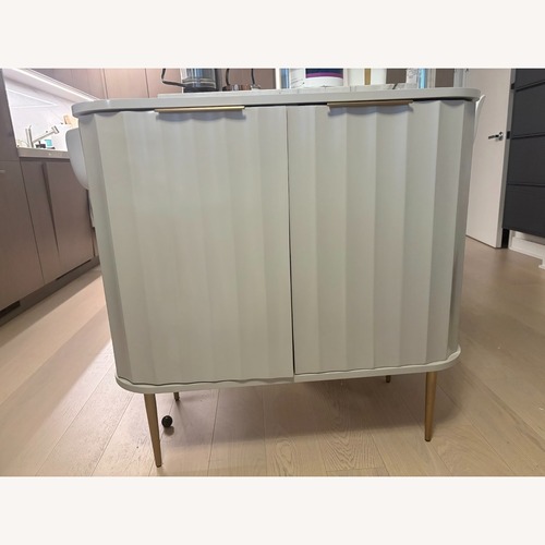 Used West Elm Natural Wood Bar Cabinet for sale on AptDeco