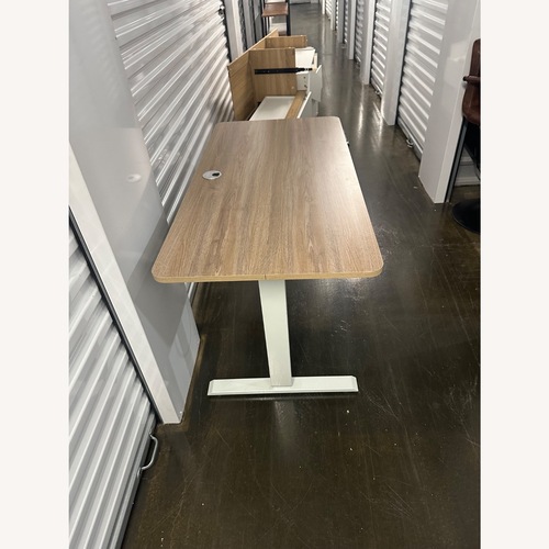 Used Light Brown Wood Desk for sale on AptDeco