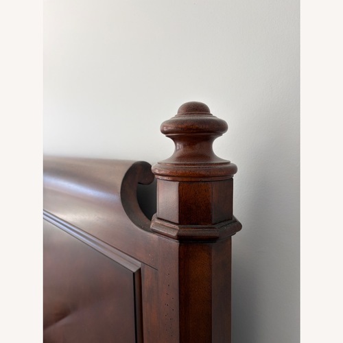 Used Dark Brown Wood King Bed for sale on AptDeco