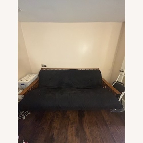 Used Black Fabric Futon for sale on AptDeco