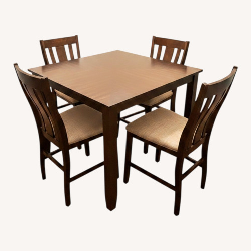 Used Dark Brown Wood Dining Set for sale on AptDeco