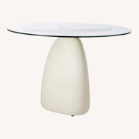 CB2 Stone 47" Round White Concrete Dining Table With Glass Top
