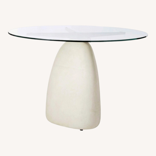 Used CB2 Stone 47" Round White Concrete Dining Table With Glass Top for sale on AptDeco