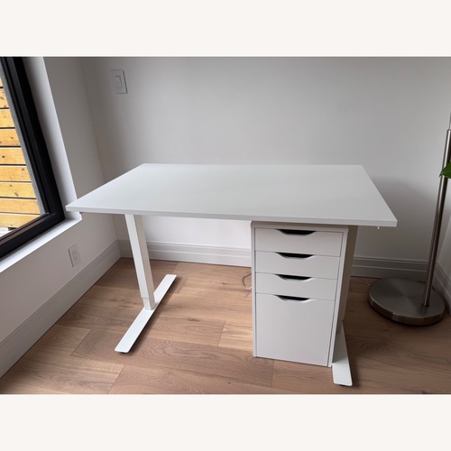 Used IKEA Trotten Sit/ Stand Desk White Desk for sale on AptDeco