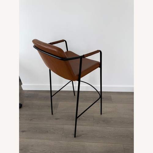 Used Room & Board Mazie Light Brown Faux Leather Stools for sale on AptDeco