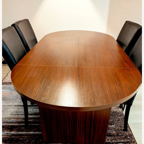 Used Dark Brown Wood Dining Table for sale on AptDeco