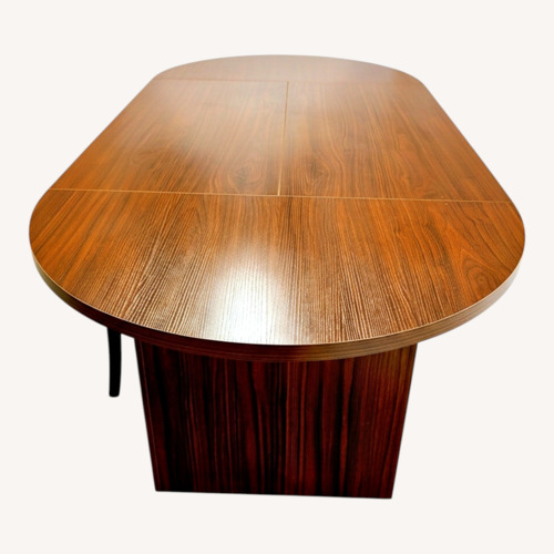 Used Dark Brown Wood Dining Table for sale on AptDeco