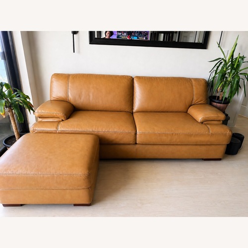 Used Genuine Leather Sofa Ottoman Camel Color  for sale on AptDeco