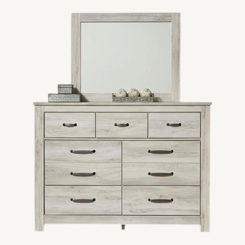 Used Ashley Furniture White Wood Dresser with Mirror for sale on AptDeco