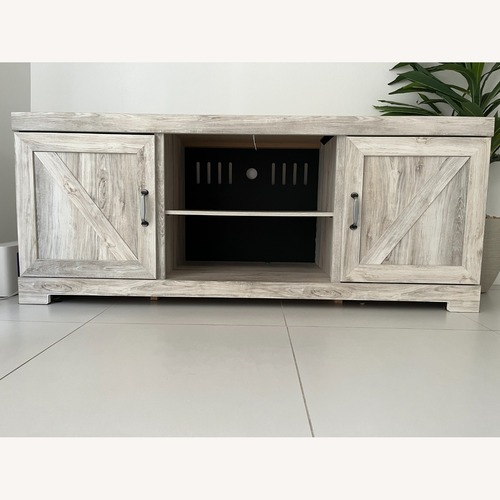 Used Ashley Furniture White Wood Media Storage for sale on AptDeco