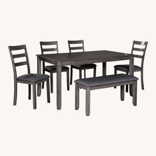 Used Ashley Dining Table with 4 Chairs and Bench for sale on AptDeco
