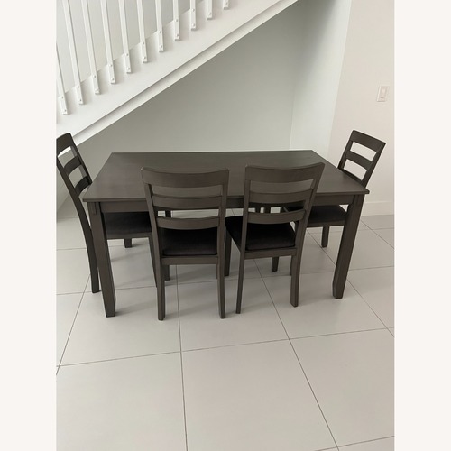 Used Ashley Dining Table with 4 Chairs and Bench for sale on AptDeco
