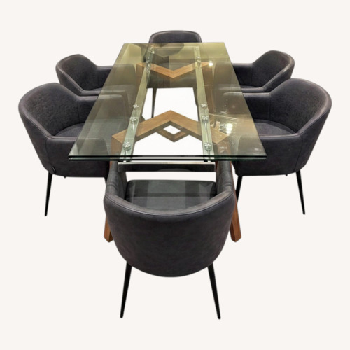 Used Dark Gray Glass Dining Set for sale on AptDeco