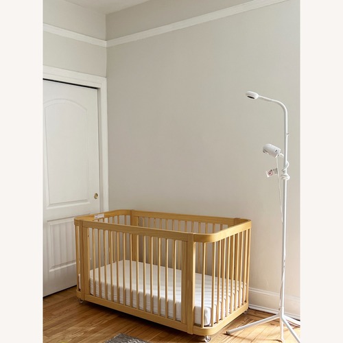 Used The Wave Crib Natural Wood Crib for sale on AptDeco
