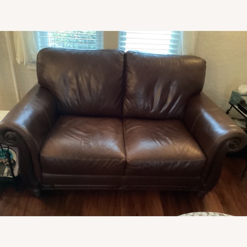 Used Chateau D'ax Dark Brown Leather Loveseat for sale on AptDeco