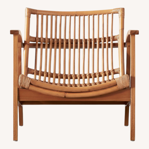Used CB2 Noelie Rattan Lounge Chair with White Cushion for sale on AptDeco