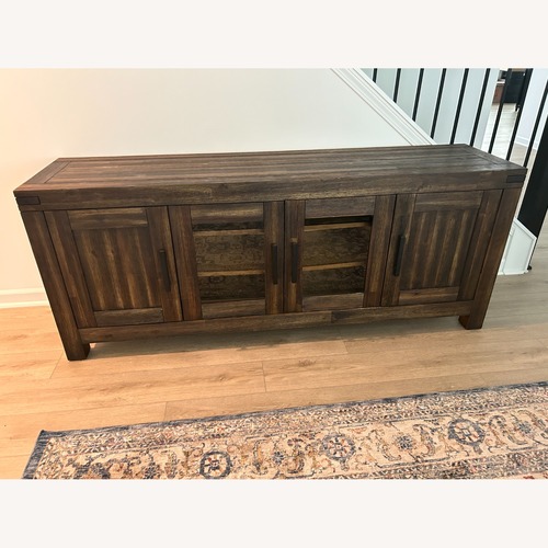 Used Avondale Dark Brown and Carved Wood Cabinet  for sale on AptDeco