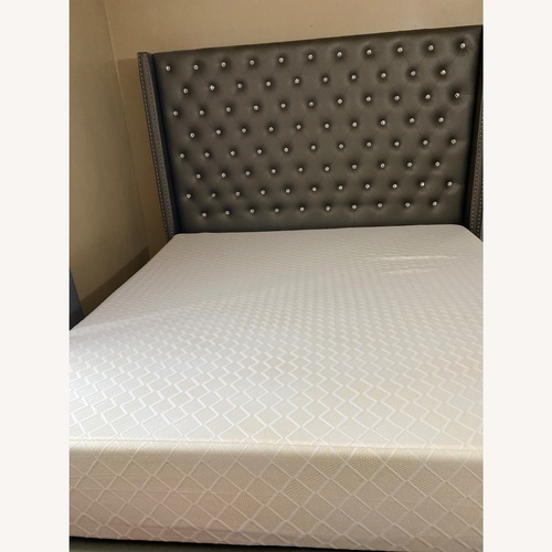 Used Ashley Furniture Franco Light Gray Leather King Bed for sale on AptDeco
