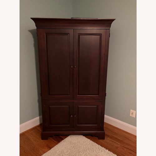 Used Dark Brown Armoire for sale on AptDeco