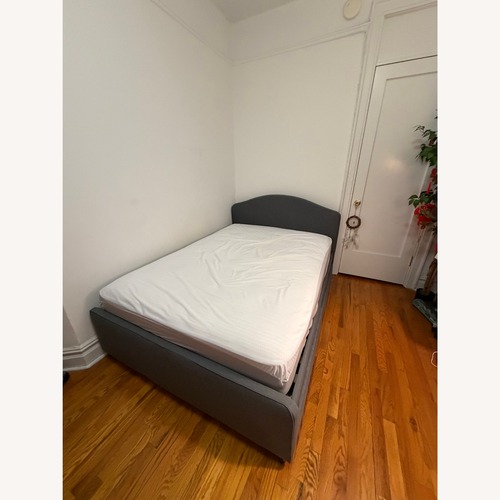 Used IKEA Hauga Dark Gray Fabric Bed + 2 Storage Boxes for sale on AptDeco