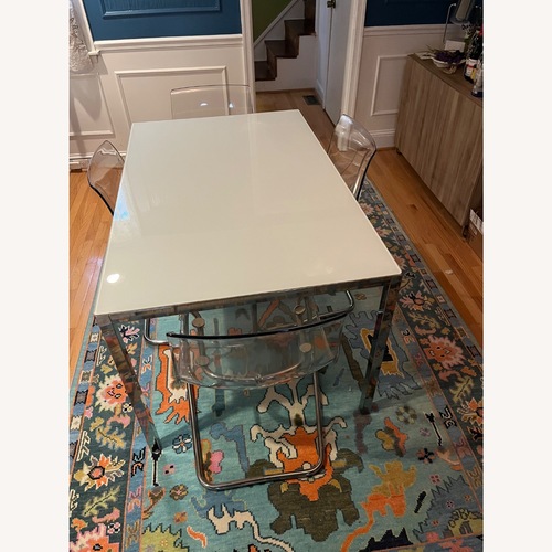 Used IKEA Torsby Glass and Chrome Dining Table for sale on AptDeco