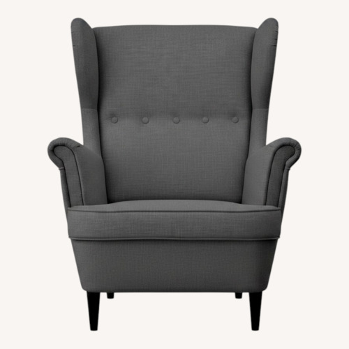 Used IKEA STRANDMON Armchair and Ottoman for sale on AptDeco