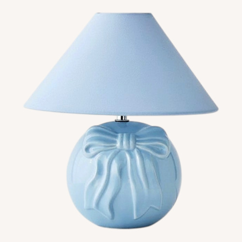 Used Urban Outfitters Bow Blue Ceramic Table Lamp for sale on AptDeco