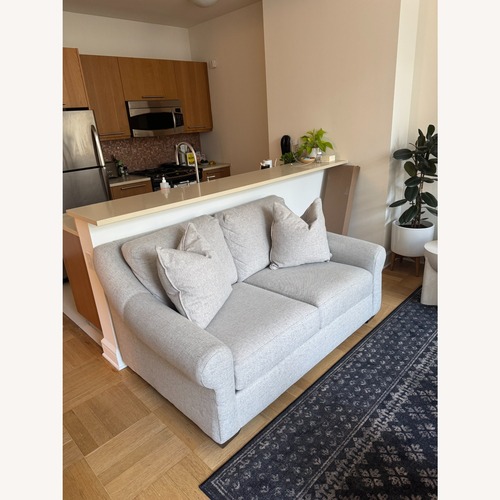 Used Raymour & Flanigan Light Gray Fabric Loveseat for sale on AptDeco
