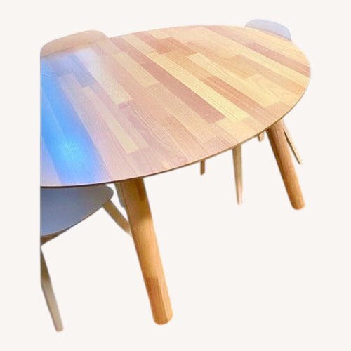 Used Natural Wood Dining Table for sale on AptDeco