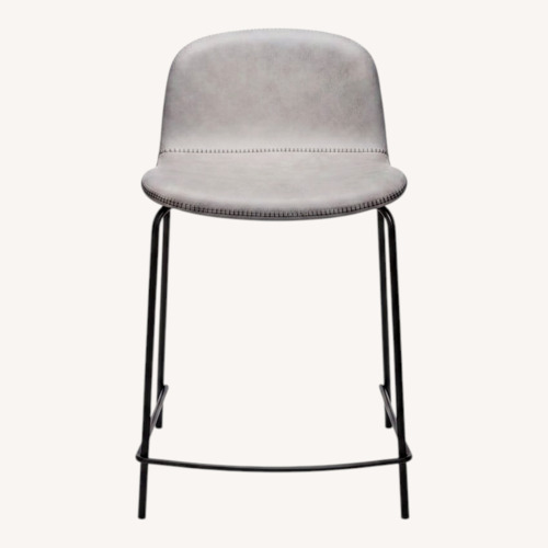 Used CB2 Primitivo Light Gray Leather Dining Chairs for sale on AptDeco