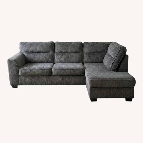 Used Better Homes and Garden Dark Gray Sectional Couch for sale on AptDeco