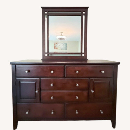Used Bob's Discount 8 Drawer Dark Brown Dresser with Mirror for sale on AptDeco