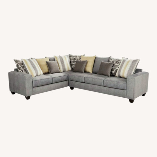 Used Rooms To Go  Dark Gray 2 Piece Sectional for sale on AptDeco
