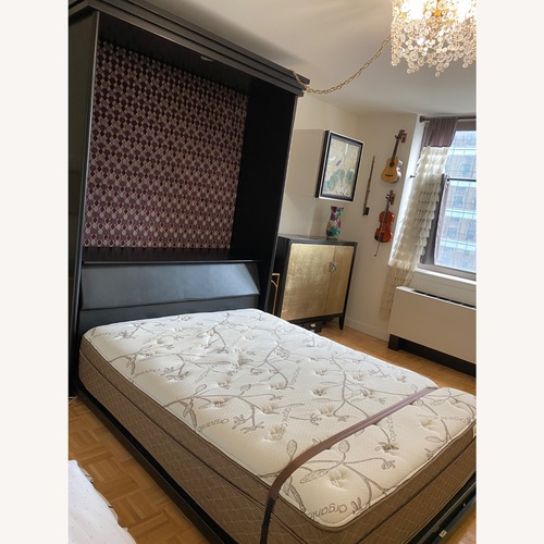 Used Black Wood Queen Bed for sale on AptDeco