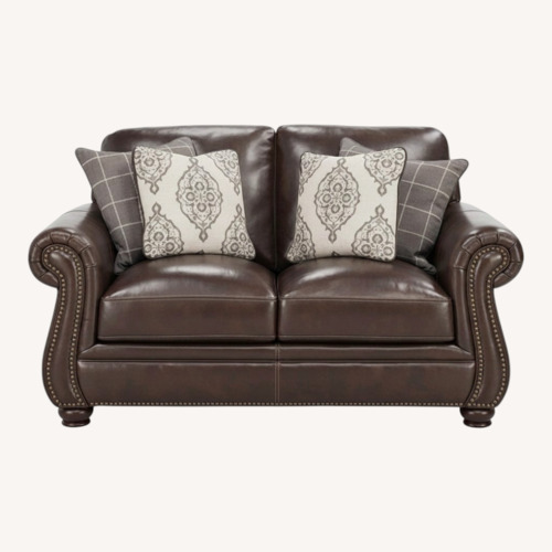 Used Raymour & Flanigan Dark Brown 2 Seater Sofa for sale on AptDeco
