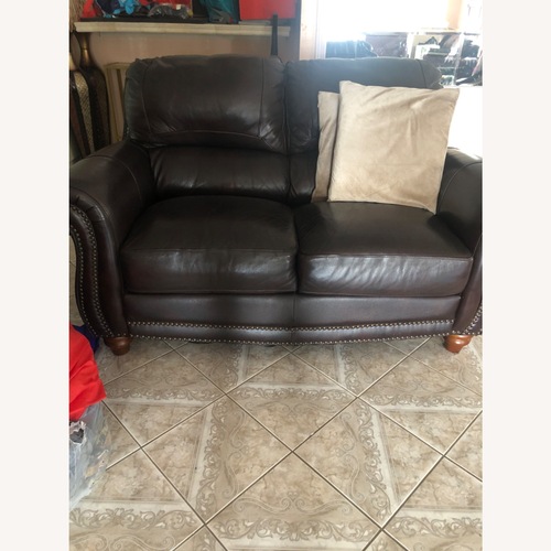 Used Raymour & Flanigan Dark Brown 2 Seater Sofa for sale on AptDeco