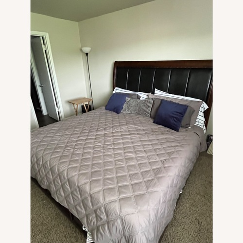 Used Dark Brown King Bed with Storage  for sale on AptDeco