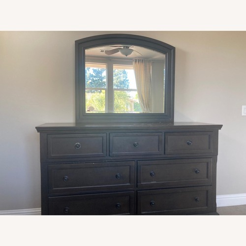 Used Dark Wood Dresser with Mirror for sale on AptDeco