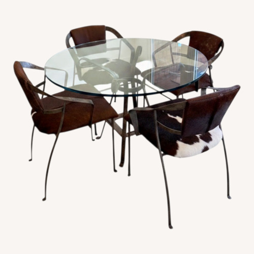 Used Antique Dining Table & 4 Cowhide Chairs for sale on AptDeco