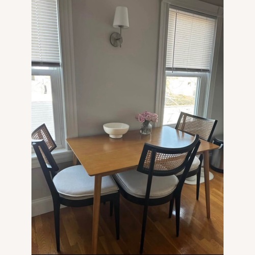 Used Crate & Barrel Black Wood and Cane Dining Chairs for sale on AptDeco