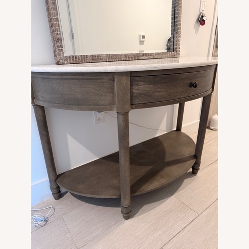 Used Pottery Barn Light Brown Wood Play Table for sale on AptDeco
